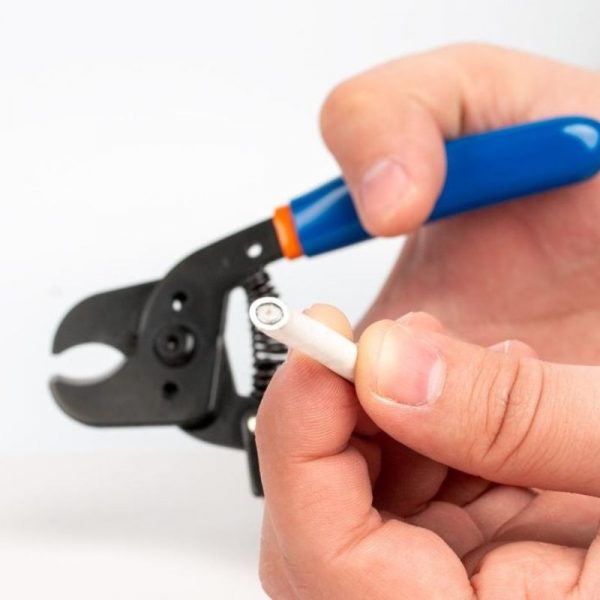 Hand Showing a Cut Wire