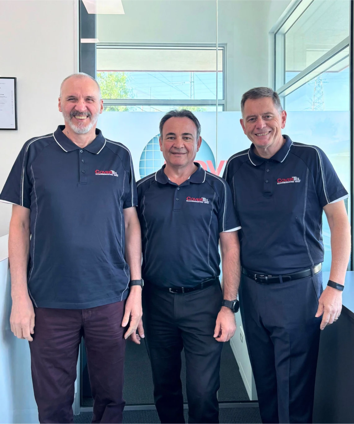 Frank John Bruno From left to right: Frank, John and Bruno wearing CoverTel shirts