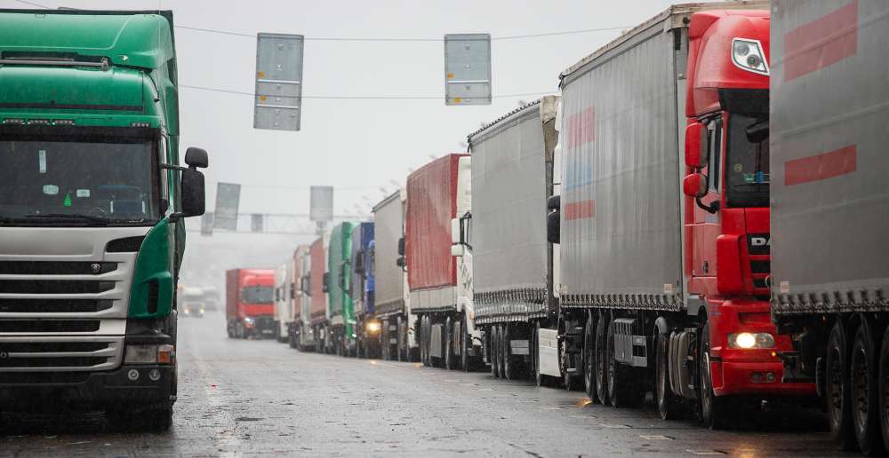 Trucks stuck in traffic Delivery trucks stuck in traffic