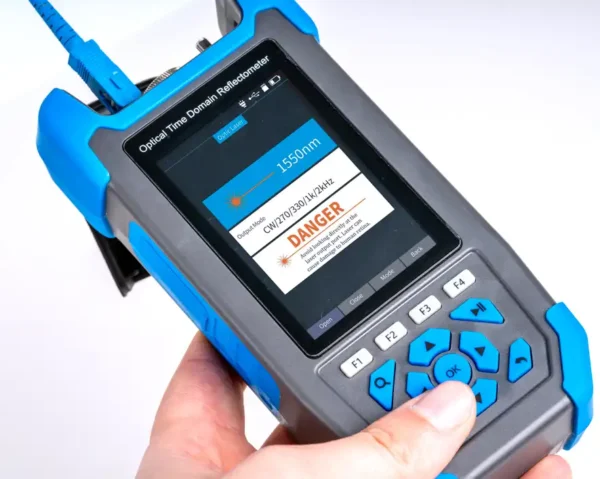Technician using Jonard Tools Multi-function OTDR to test fiber optic cables in the field.